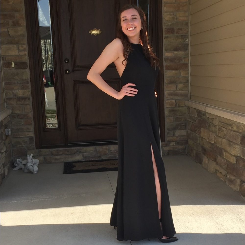 Long, backless, simple black dress